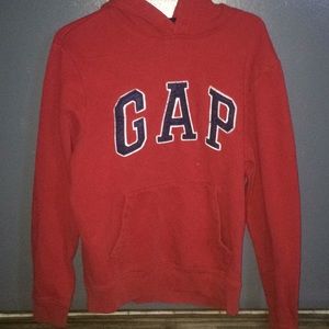 It’s a red GAP hoodie